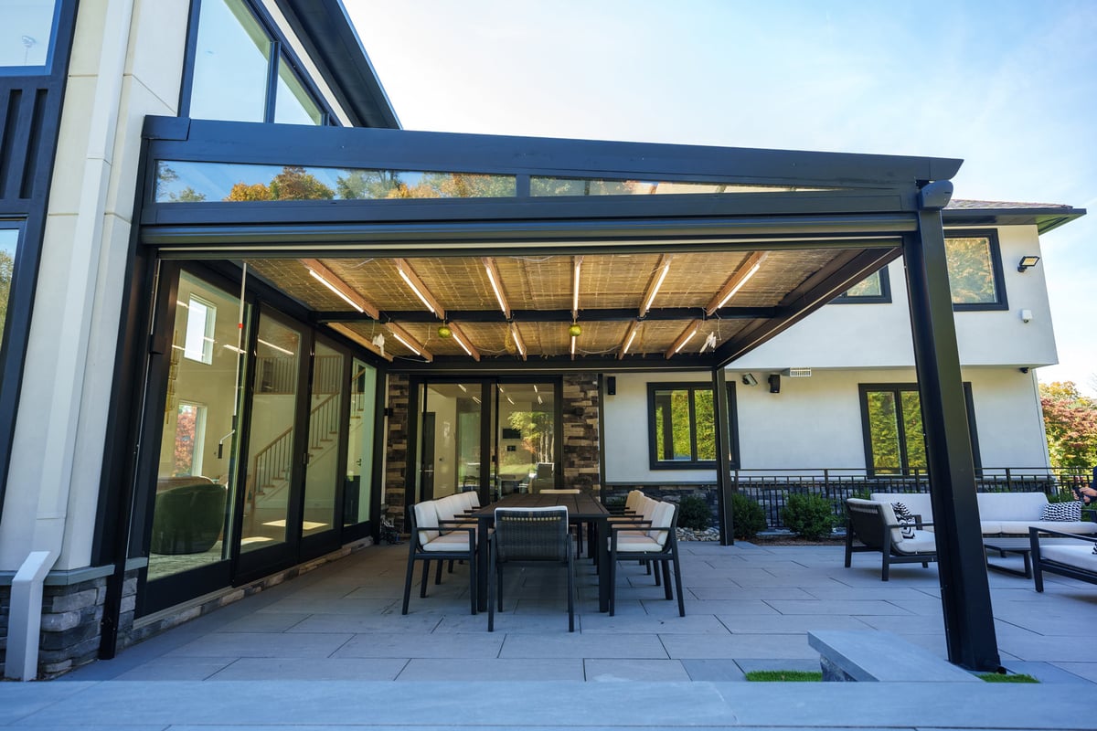 A patio with illuminated pergola Sukkah