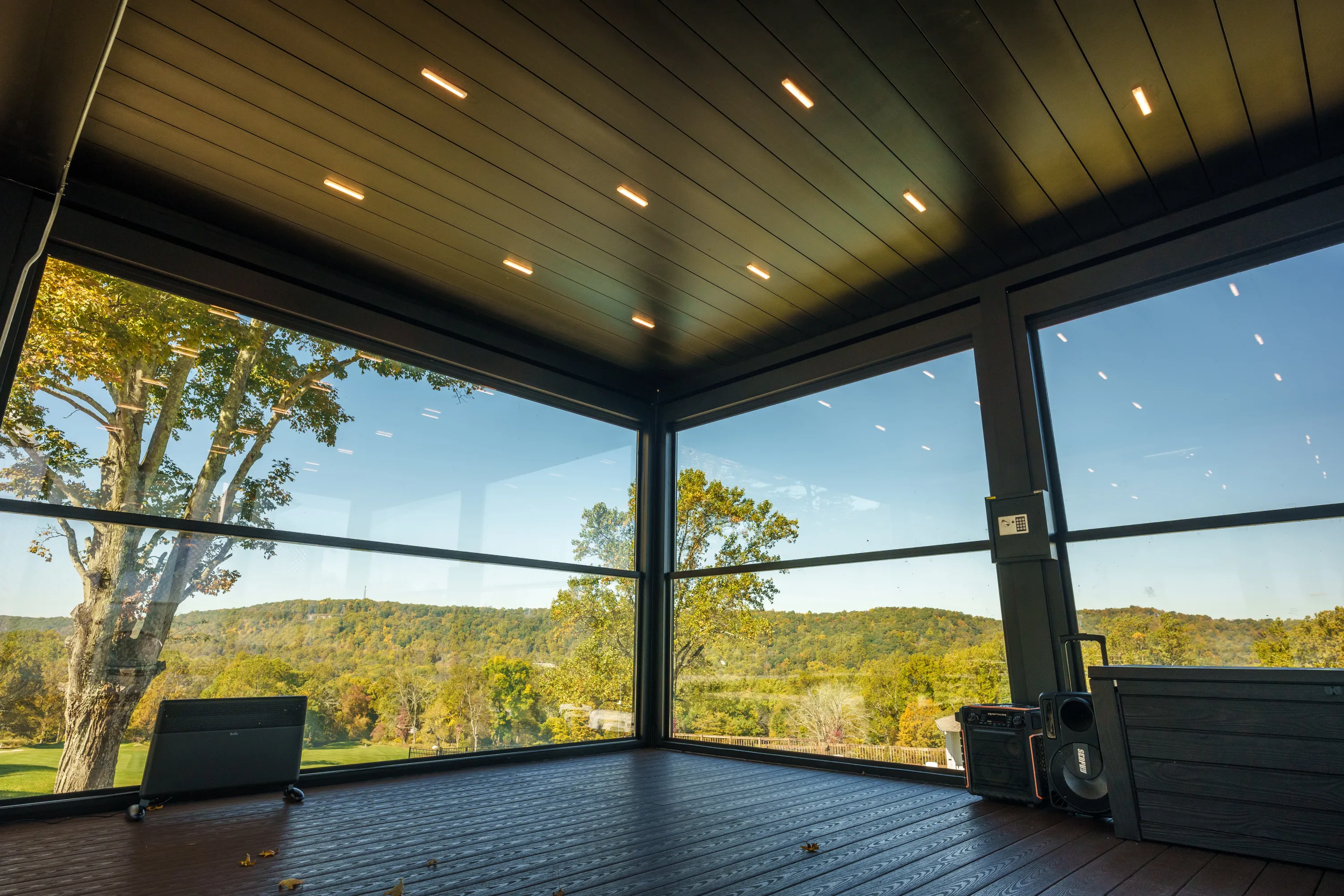 Featured image: Louvered pergola in an open space overlooking the greenery - Read full post: How to Choose the Right Louvered Pergola for Your Space?
