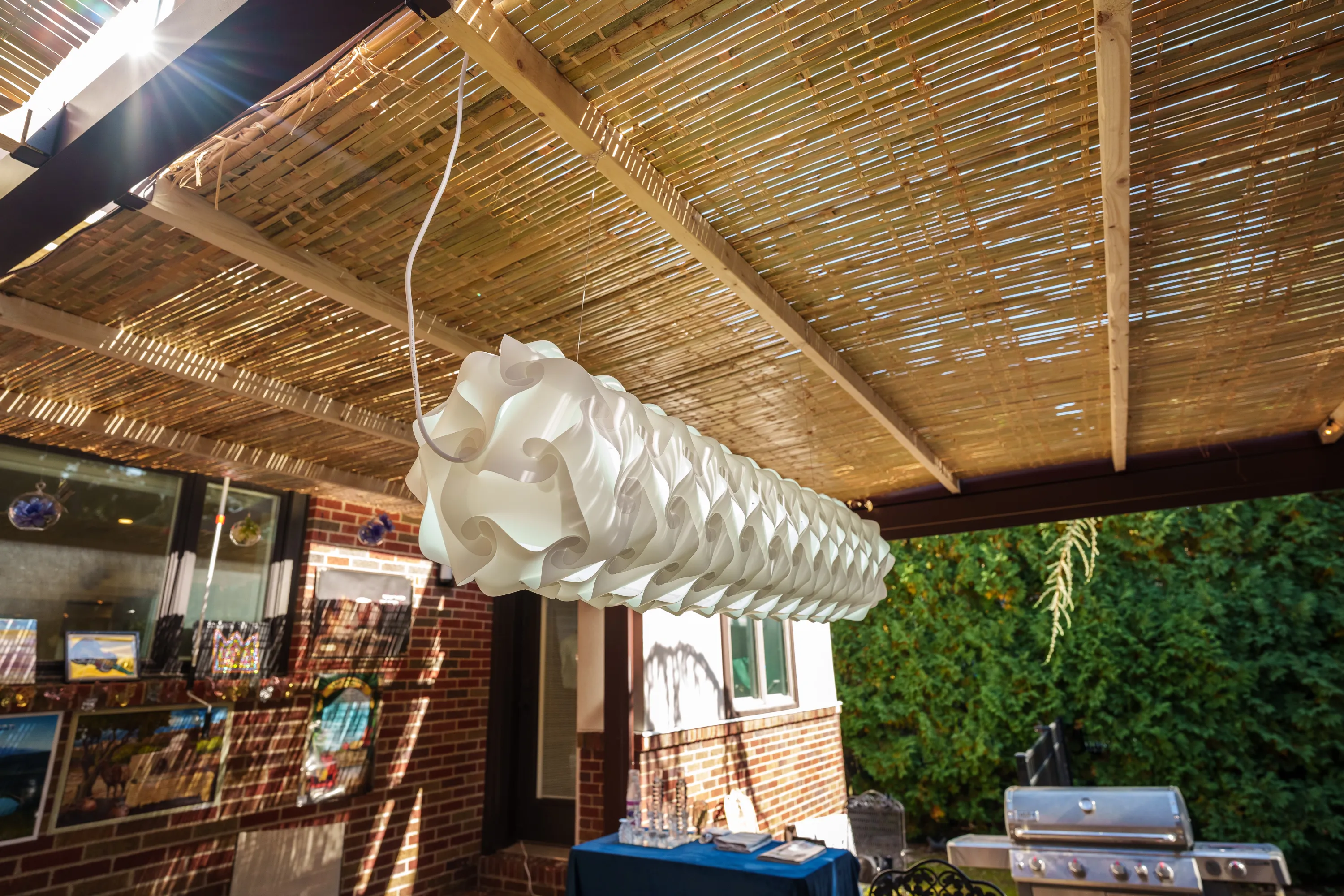 Featured image: Sukkah decoration with paper chains, hanging ornaments - Read full post: Maximizing Your Pergola Space for Your Sukkah: A Guide to Building a Custom Sukkah