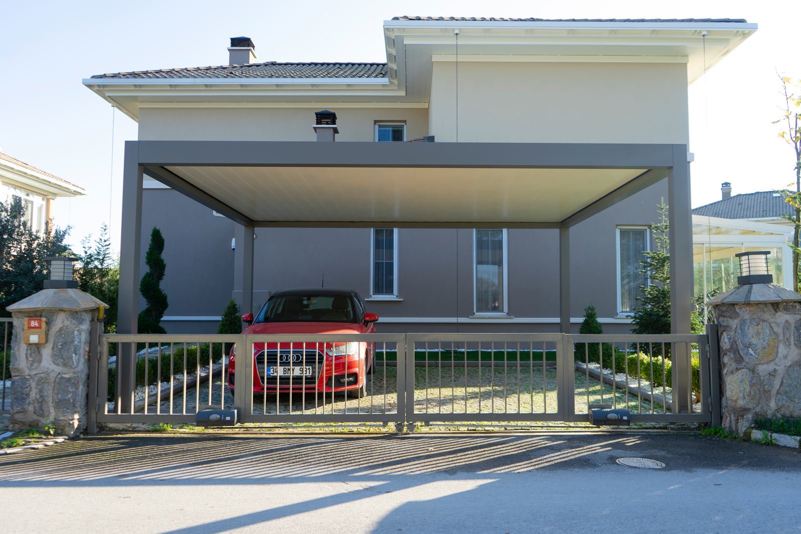 Louvered roof carport